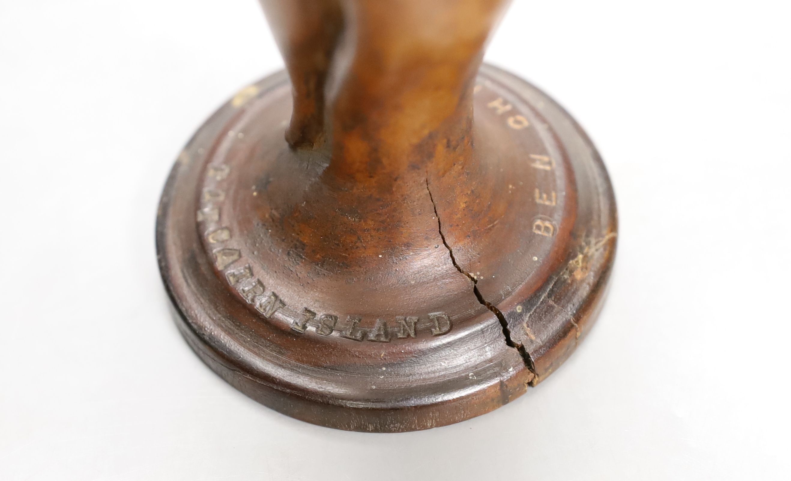A wooden vase 'Ben Christian Pitcairn Island', approx 24 cms high.